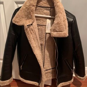 Leather jacket with fur lining